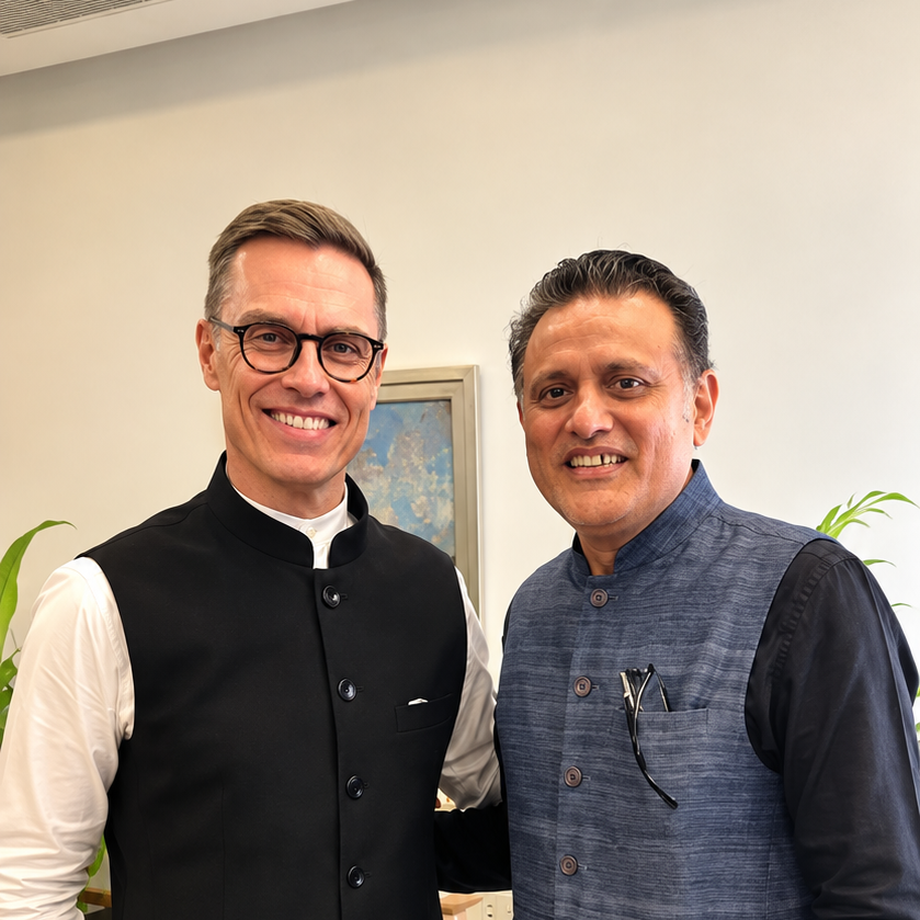 Two business representatives posing after a meeting